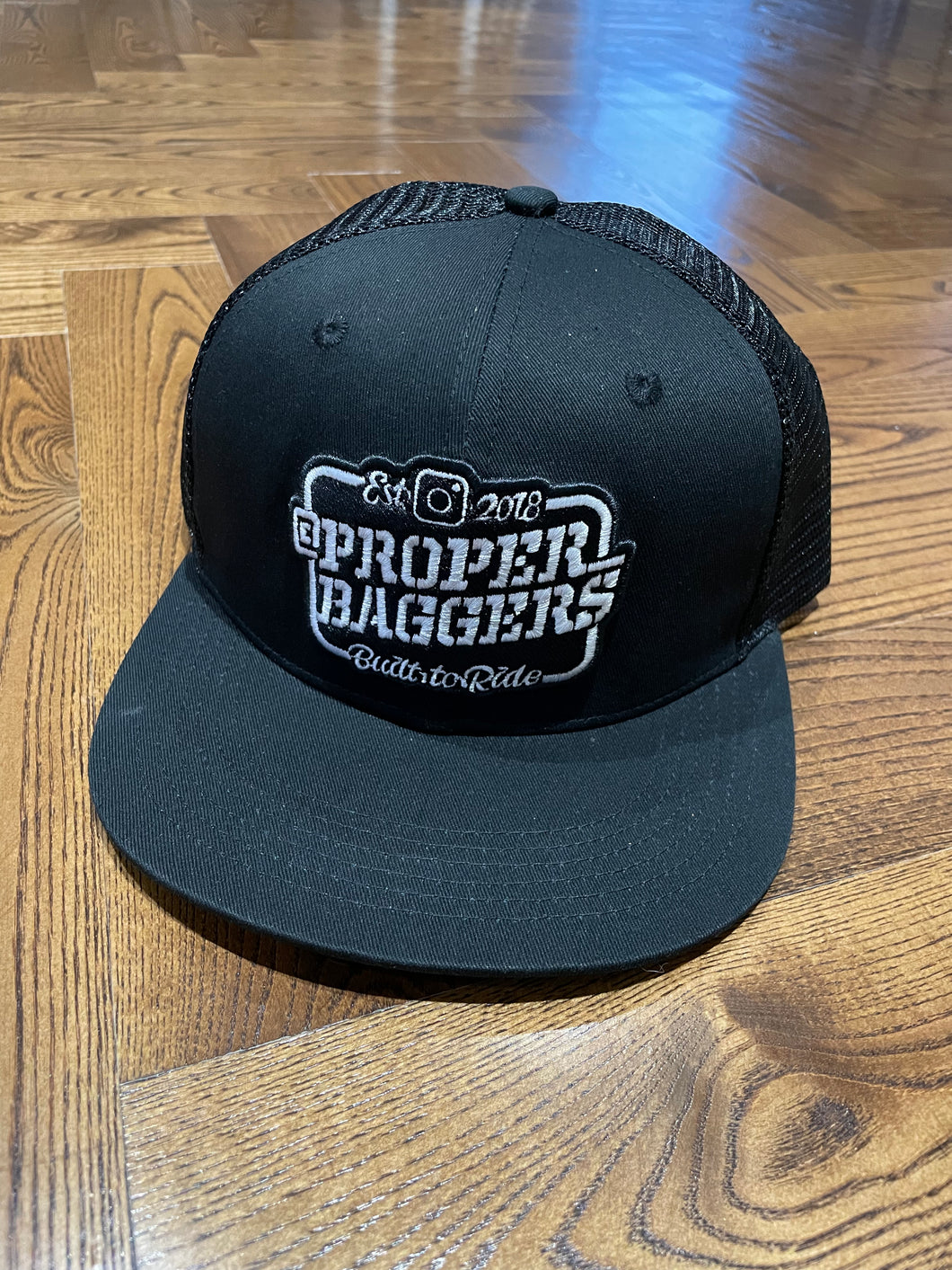 Proper Baggers Trucker Hat